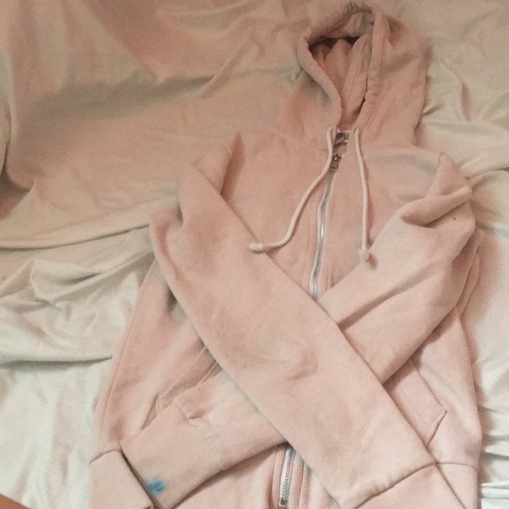 light pink zip up with white strings